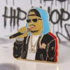 Colorful enamel pin representing hip hop culture, designed with bold graphics and a trendy aesthetic.