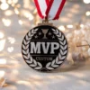 A shiny medal featuring the inscription "MVP Custom," representing a top performer in a sporting event.