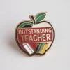 Colorful enamel pin that reads "Outstanding Teacher," perfect for recognizing and honoring dedicated teachers.