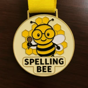 Medal featuring the words "Spelling Bee" prominently displayed on its surface.