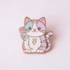 Feminist cat pin featuring a cute cat design, symbolizing empowerment and love for felines.
