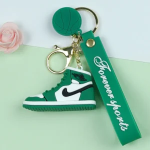 Green PVC Nike keychain featuring a shoe and a rose design, perfect for adding a stylish touch to your keys.