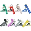 A collection of colorful PVC Nike keychains shaped like sneakers, showcasing various designs and hues.