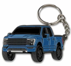 Blue enamel truck keychain featuring a black truck design, perfect for truck enthusiasts or as a stylish accessory.