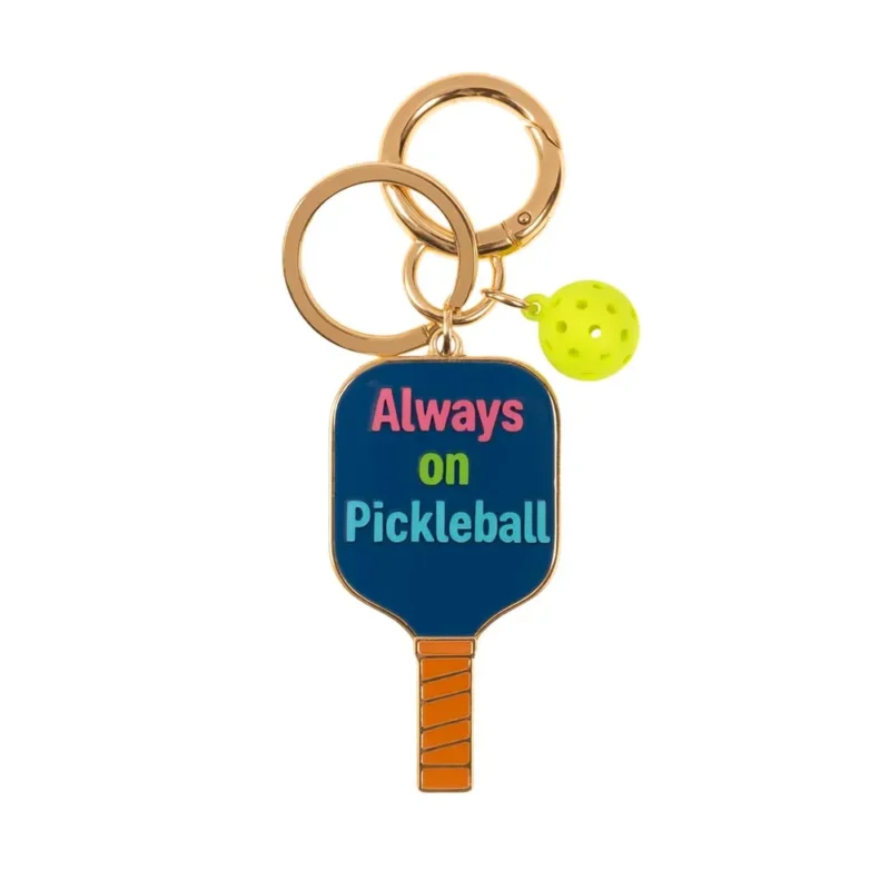 Enamel keychain featuring a pickleball design, perfect for enthusiasts who love the sport.