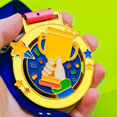 A child proudly holds a medal featuring a gold star, celebrating their achievement in a fun competition.