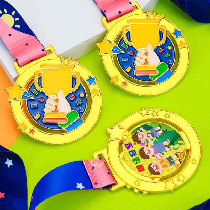 Three colorful kid medals with ribbons and stars, symbolizing achievement and participation in activities.