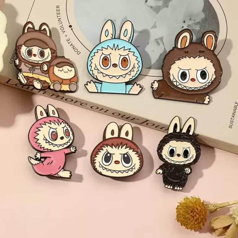 A set of four cartoon rabbit pins featuring colorful designs by Labubu.