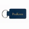 Personalized navy leather keychain with embossed design, perfect for keeping keys organized and stylish.