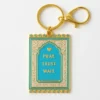 Keychain featuring the words "pray, trust, wait" alongside a small prayer mat design.