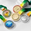 A collection of spinning medals with colorful ribbons attached, showcasing various designs and achievements.