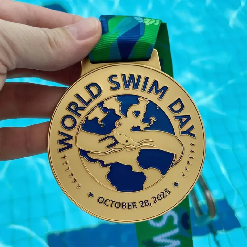Enamel medal for World Swim Day, featuring a swimming motif and vibrant colors, celebrating aquatic achievements.