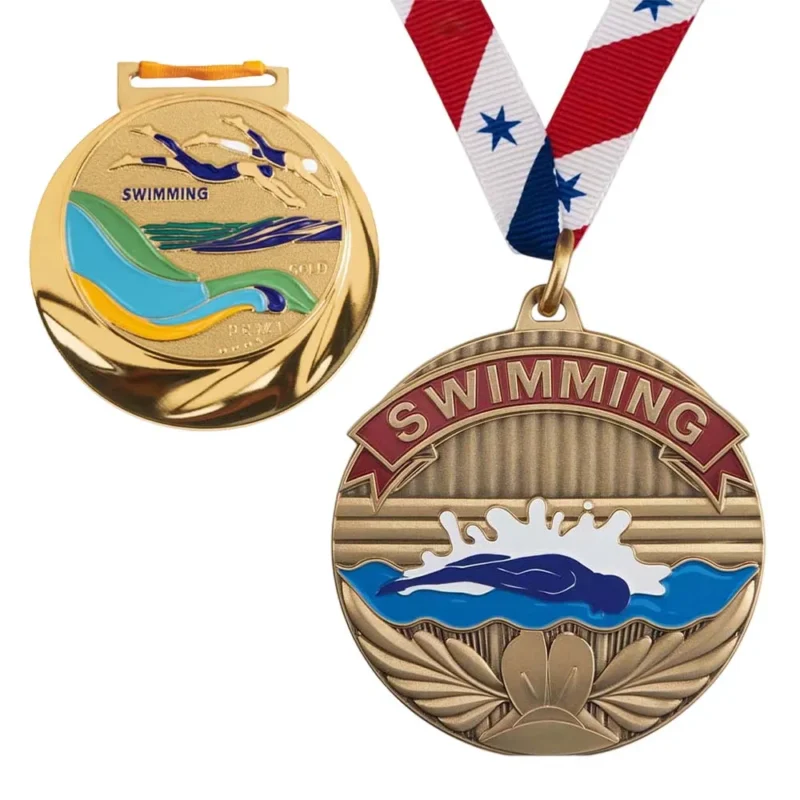 Two enamel swimming medals, each featuring the word "swimming" prominently displayed.