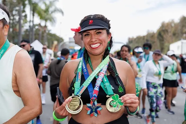 ASICS Los Angeles Marathon participants with medal