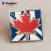 A Canadian flag pin featuring a red maple leaf, symbolizing Canada’s national identity and pride.