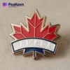 Custom logo pin featuring a Canada maple leaf design, symbolizing Canadian pride and identity.