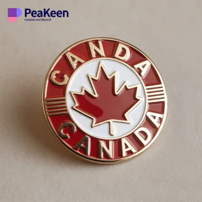 Custom enamel pin featuring a Canada maple leaf design, symbolizing Canadian pride and identity.