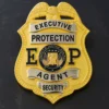 Badge displaying the words "Executive Protection Agent" prominently featured in a security design.