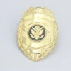 Gold executive badge featuring the US flag, symbolizing authority and national pride.