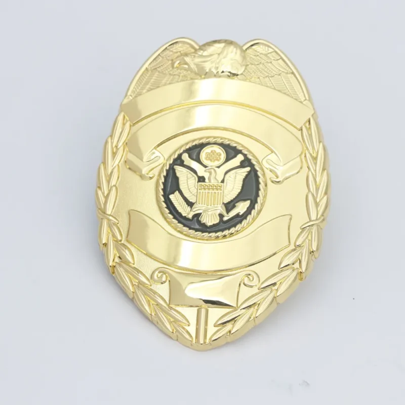 Gold executive badge featuring the US flag, symbolizing authority and national pride.