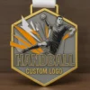 Custom handball medals, symbolizing achievement and competition in the sport.