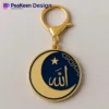 Gold and blue Islamic keychain featuring an enamel moon and the name of Allah elegantly displayed.