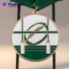 Customized rugby medal featuring a unique design, showcasing a rugby ball and team emblem.