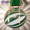 Gold medal with a green ribbon featuring a rugby ball design, representing rugby achievements.