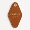 Custom leather key tag mockup featuring a genuine leather keychain with a sleek design and personalized engraving option.