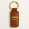 Custom leather keychain mockup showcasing a genuine leather design with a keyring attachment.