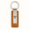 Custom genuine leather keychain featuring personalized text, showcasing a sleek and stylish design.
