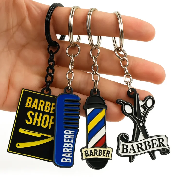 A hand displays a keychain with miniature barber shop items, such as scissors and a comb, highlighting barber culture.
