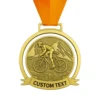 Gold medal featuring custom text, representing achievement in cycling competitions.