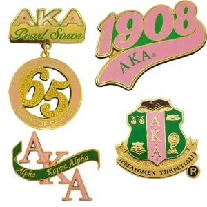 Alpha Kappa Phi pin set featuring intricate designs, representing membership and unity within the organization.