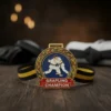 Grappling champion medal resting on a wooden table, showcasing its shiny surface and intricate design.