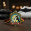 Medal featuring a German flag and a black belt, representing grappling achievements.