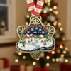 Christmas-themed medal depicting a holiday scene, earned in a Christmas run.