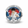 A pin badge featuring the phrase "White Best Warrior," designed for jiu jitsu beginners.
