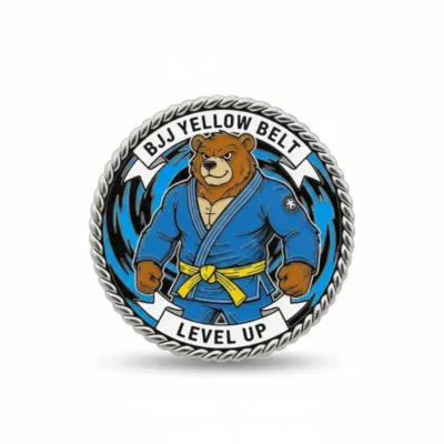 Badge featuring a bear in a blue and white uniform, adorned with a yellow belt pin.