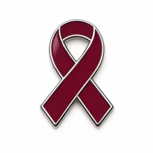 A simple burgundy ribbon pin with a glossy finish, outlined with a silver border.