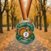 A vibrant Turkey Trot medal adorned with an orange ribbon, representing a fun running event during the holiday season.