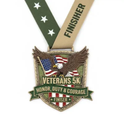Veterans 5K medal featuring the phrases "Honor, Duty, and Courage" engraved on its surface.