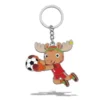 A cartoon moose mascot wearing a red soccer jersey with the number 1, diving and catching a soccer ball with its hands, attached to a keychain.