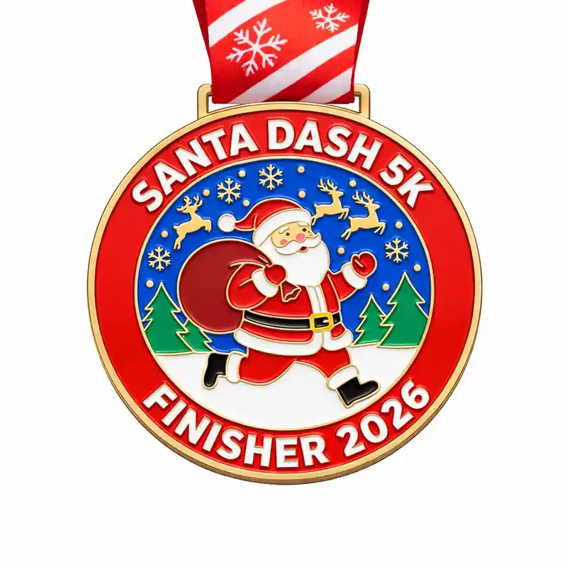 A colorful medal featuring Santa Claus running with a gift bag, surrounded by snowflakes and reindeer in a snowy landscape, with the inscription "SANTA DASH 5K" and "FINISHER 2026" at the bottom, along with a red ribbon adorned with snowflakes.
