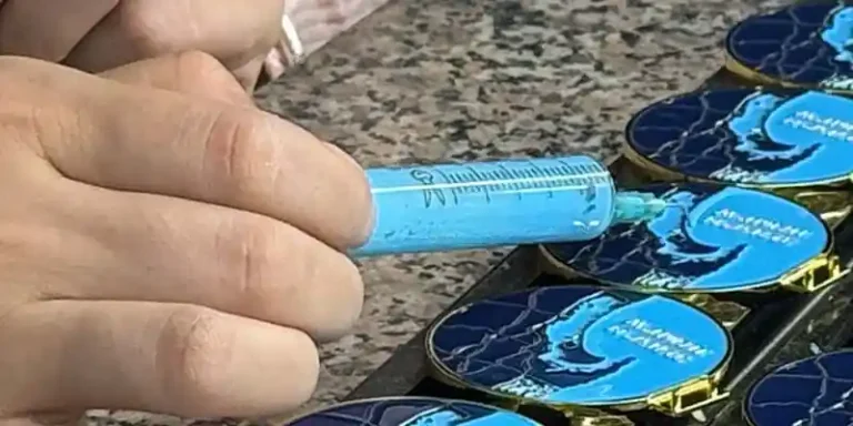 Hand-coloring on medals