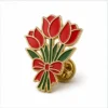 Bouquet Red Tulip Pin soft enamel pin with raised metal outlines, flat enamel color sections, connected badge details, and a butterfly clutch on a white background.
