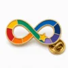 Rainbow infinity neurodivergent pin with raised gold metal outlines, colorful enamel segments, a connected star detail, and a butterfly clutch on white.