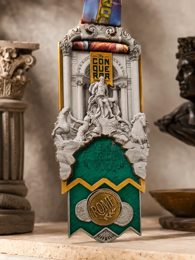 A highly detailed medal called "The Conqueror," featuring Roman architecture design, a green pull-down section revealing the core with "VENI VIDI VICI," and a bronze coin labeled "ROME."
