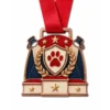 Show podium Best in Show Medal soft enamel medal with rose gold metal outlines, red neck ribbon, three-tier podium shape, paw shield, laurel leaves, stars and spotlights, and white background.