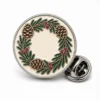Wreath Pine Cone Pin soft enamel pin with raised metal outlines, flat enamel color sections, connected badge details, and a butterfly clutch on a white background.